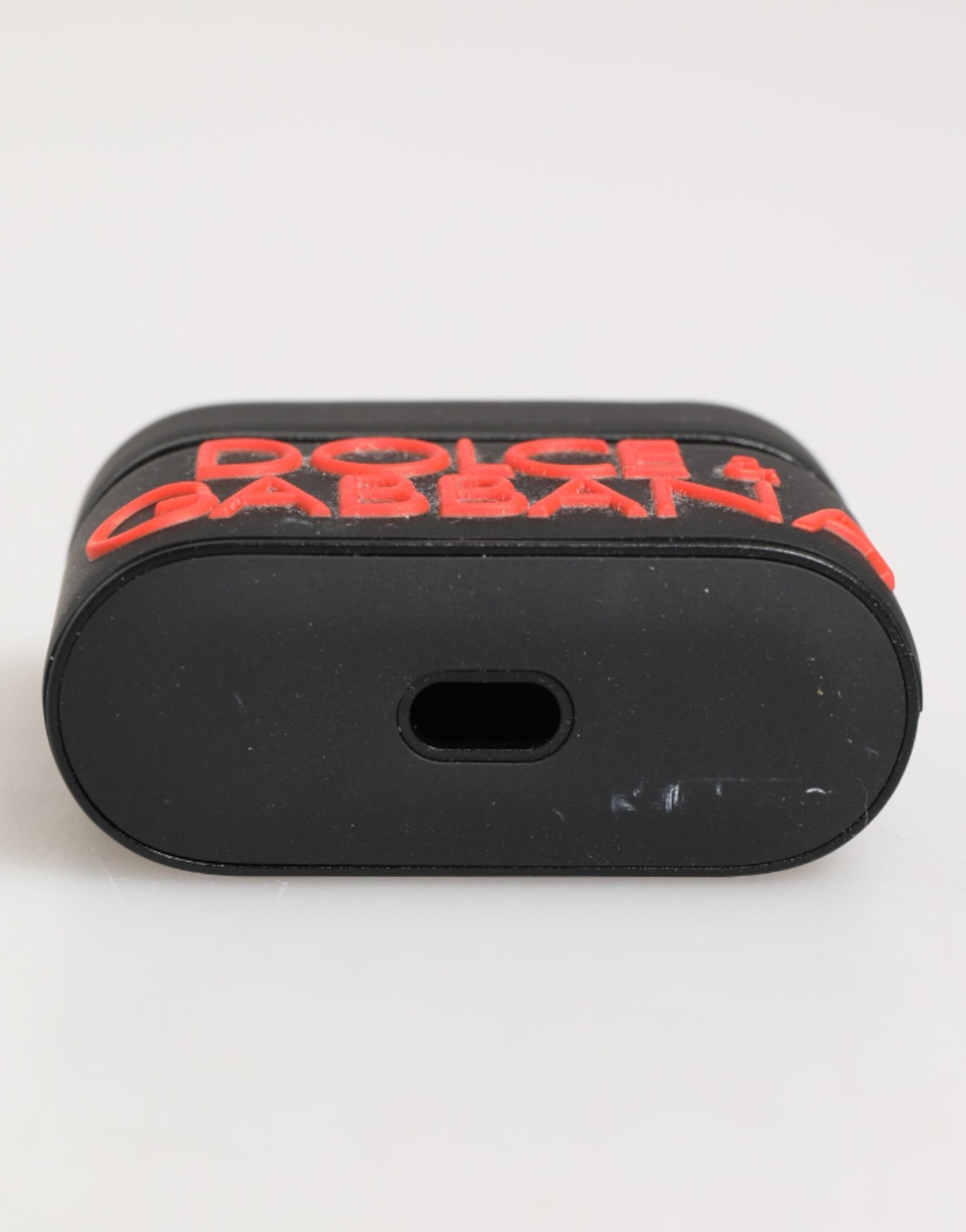 Custodia per Airpods Dolce &amp; Gabbana con logo in gomma nero-arancione in rilievo