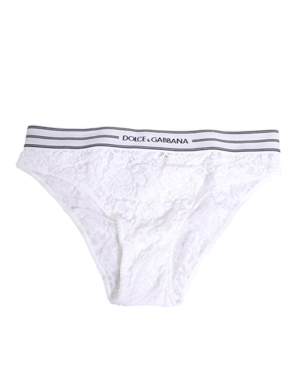 Slip in pizzo bianco Dolce &amp; Gabbana con logo e cintura in vita