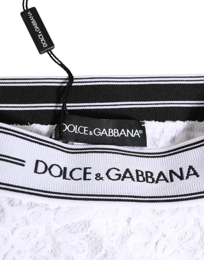 Slip in pizzo bianco Dolce &amp; Gabbana con logo e cintura in vita