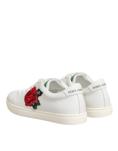 Scarpe basse Dolce &amp; Gabbana in pelle bianca con ricamo a forma di rosa
