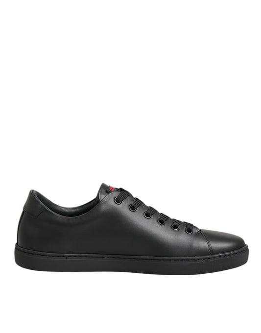 Dolce &amp; Gabbana Scarpe da ginnastica basse in pelle nera con cuore di cristallo