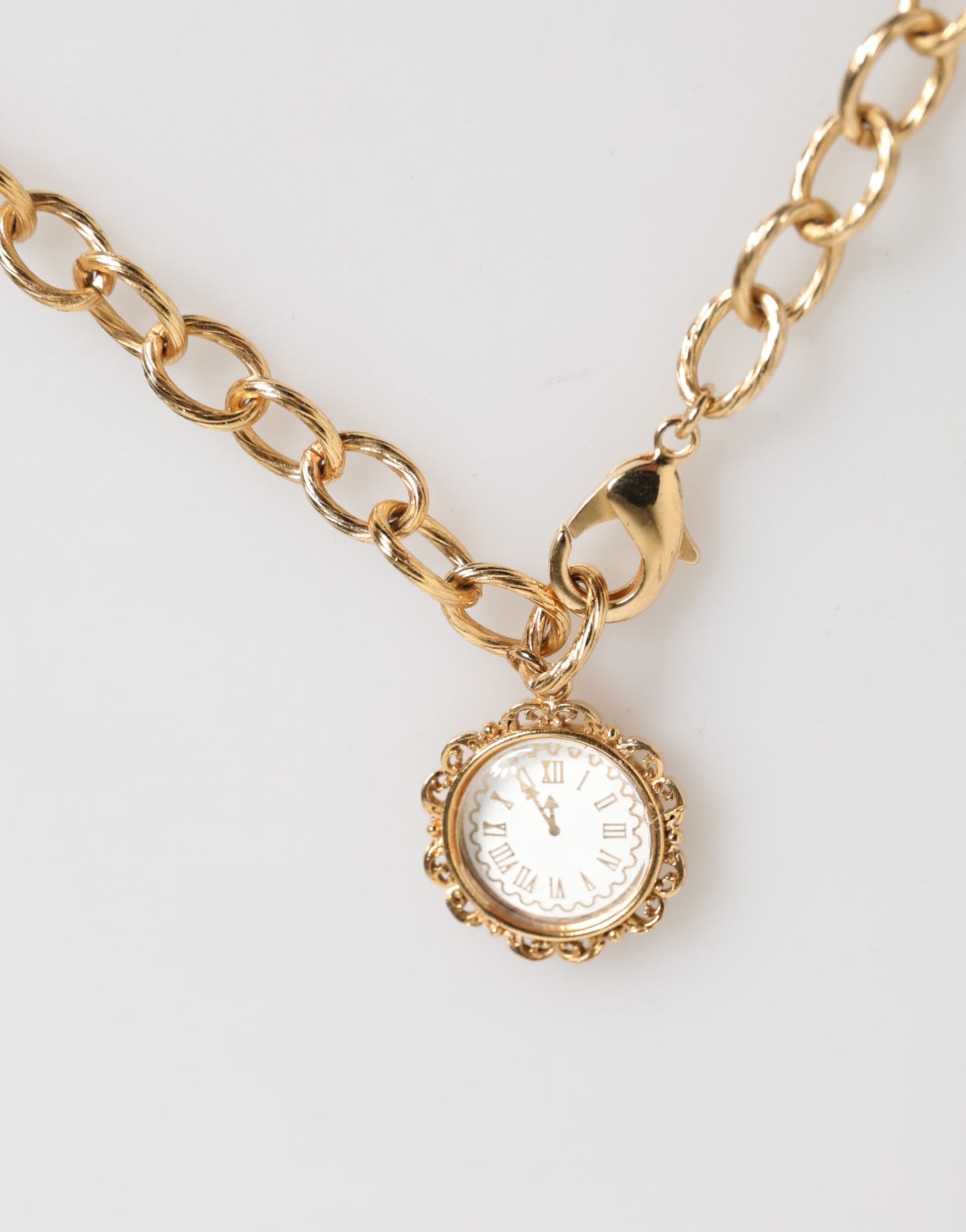 Collana con ciondolo e orologio in cristallo dorato Dolce & Gabbana